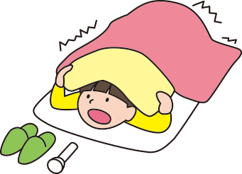 布団で頭を守る人